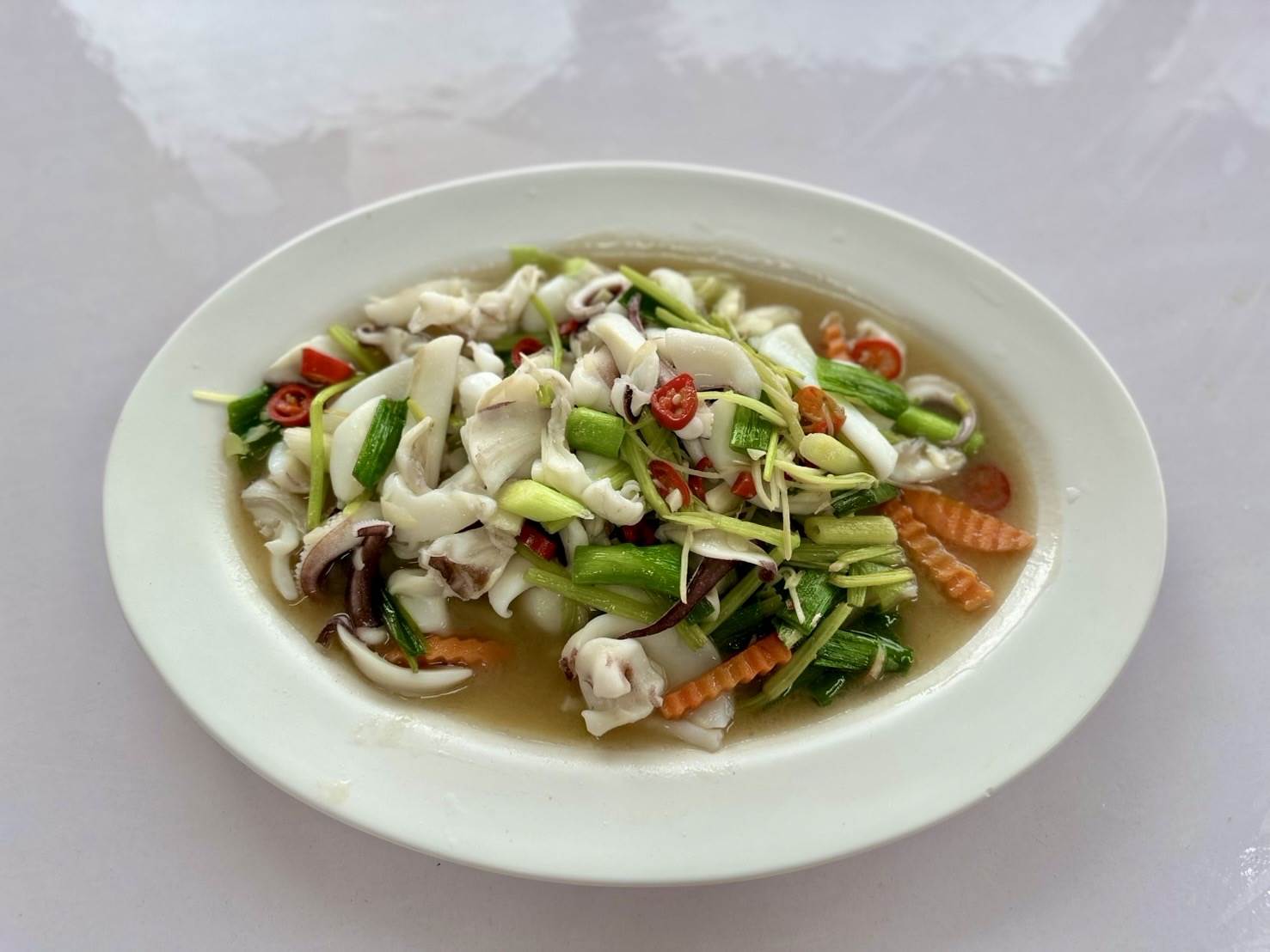 富基魚市亦有提供代客料理的花枝菜色。