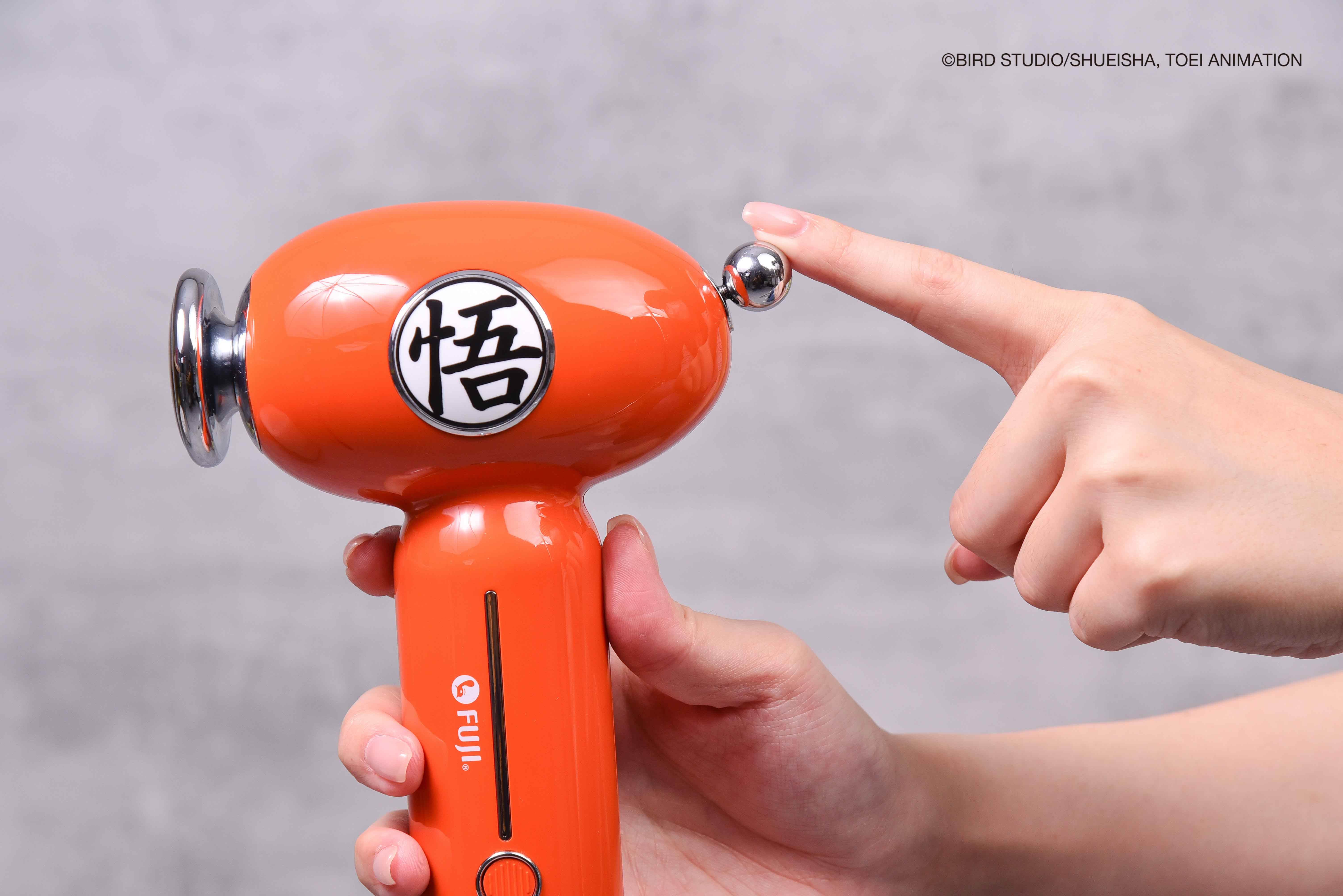 FUJI 日式按摩槍搭配復古珍珠撥檔控溫設計，讓溫度調節變得輕鬆簡便，溫暖能量直達肌肉深處舒緩緊繃感 (圖_FUJI 提供)