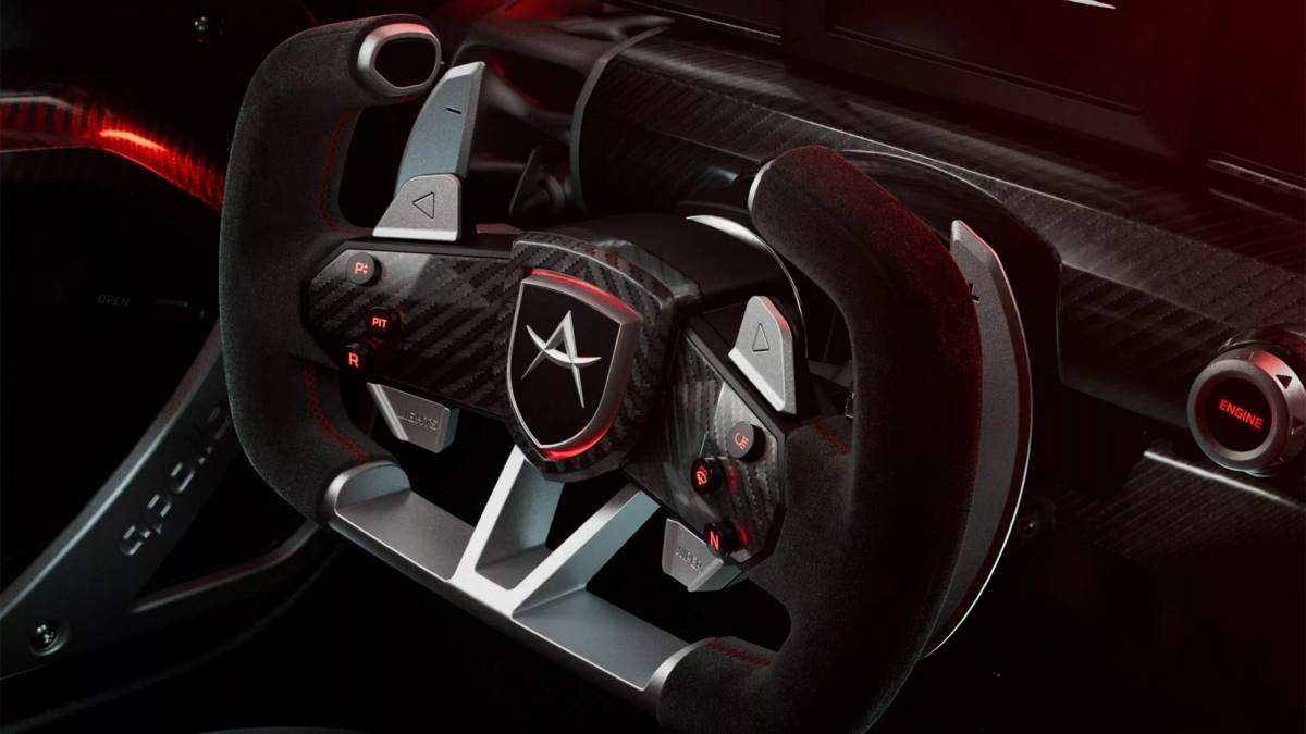 方向盤上的按鍵都以功能性為主,造型採用類似F1的矩形方向盤。(圖/Apollo提供)