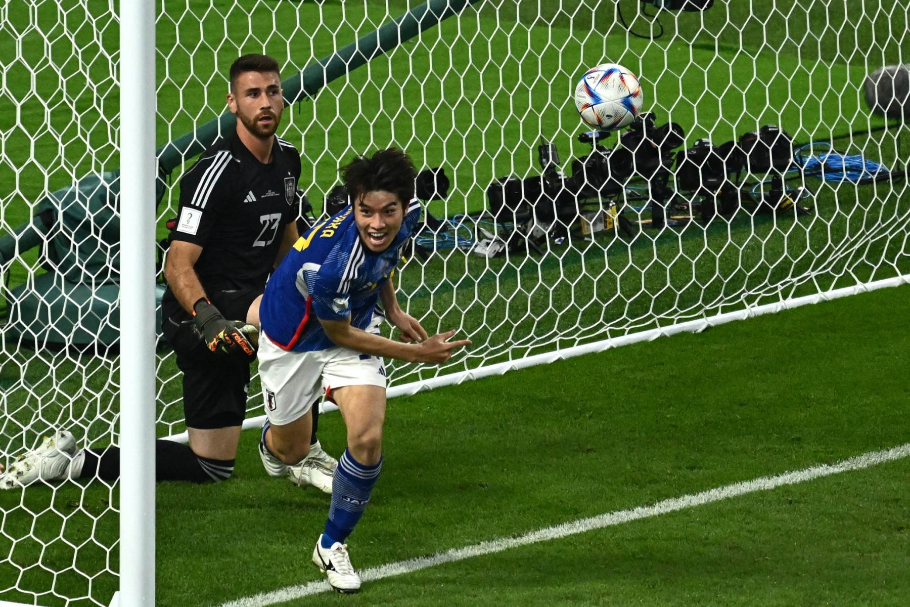 AFP__20221201__32XD6HP__v5__Mockup__TopshotFblWc2022Match43JpnEsp