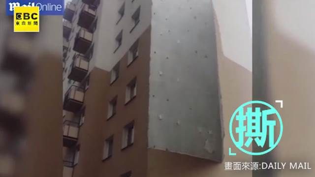 大樓像壁紙 「嘶」一聲掉落地